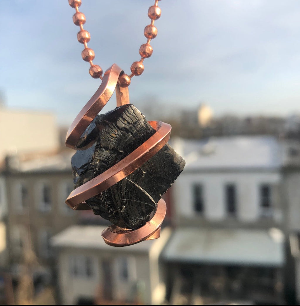 Wearable EMF protection necklace. Elite Shungite crystal pendant hand wrapped in pure copper. 